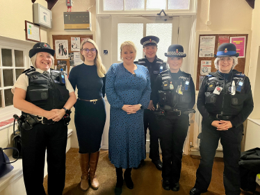 Pictured with Maxine Cilla, Local Borough Commander and her officers. 